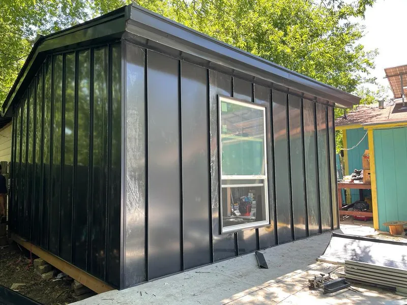 Black standing seam metal wall panels for Metal Roof Installation in Pantops