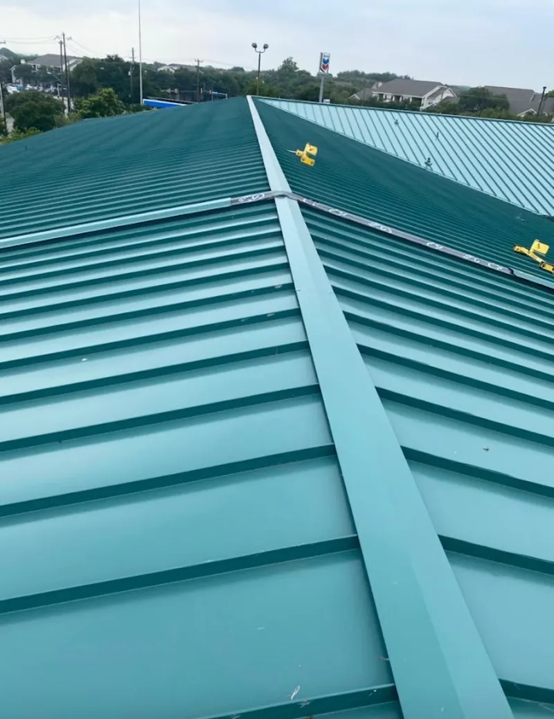 Green commercial metal roof ridge and valley for Metal Roof Repair in Pantops
